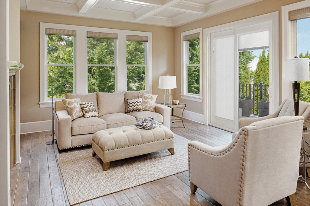 Here you can see Preservation replacement windows with a french style patio door and blinds between the glass.