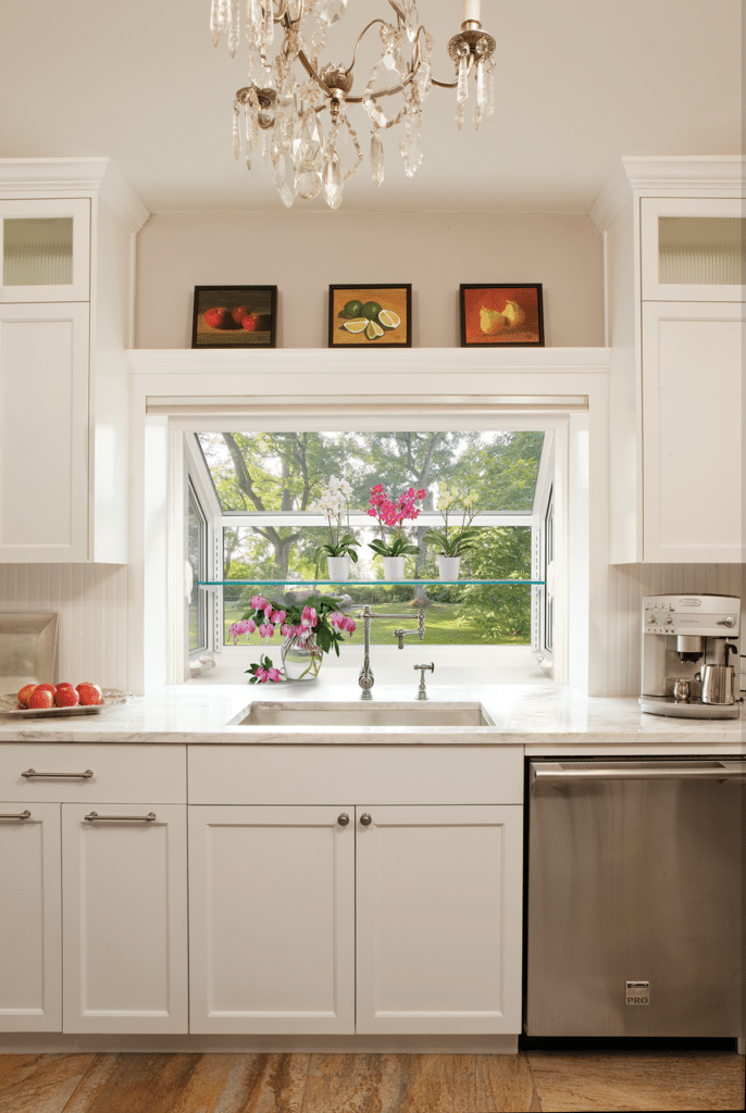 Here you can see a Preservation garden window. They come standard with one adjustable glass shelf and you can add a second shelf if you'd like. The sides open outwards for ventilation.